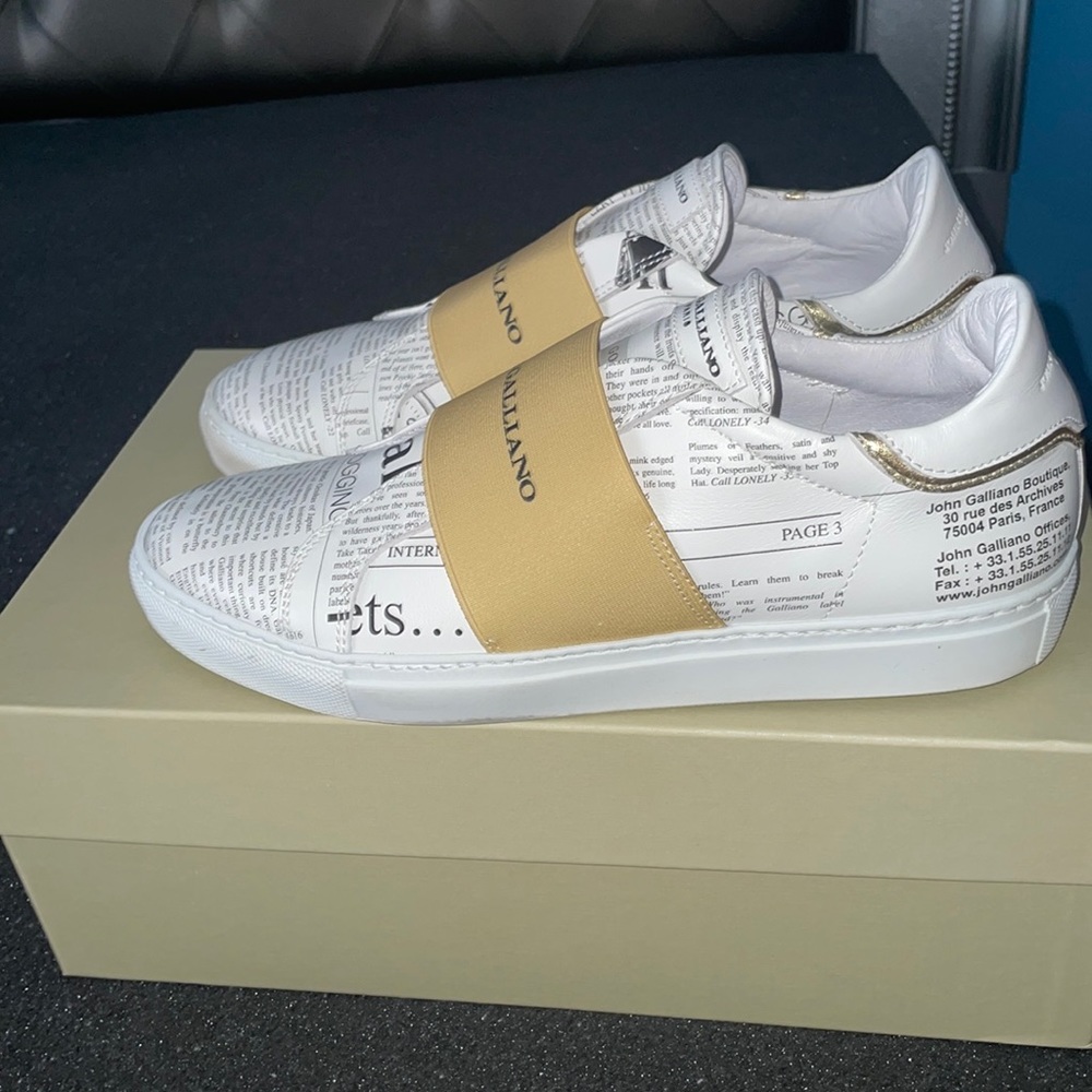 Newspaper low top John galliano sneakers.